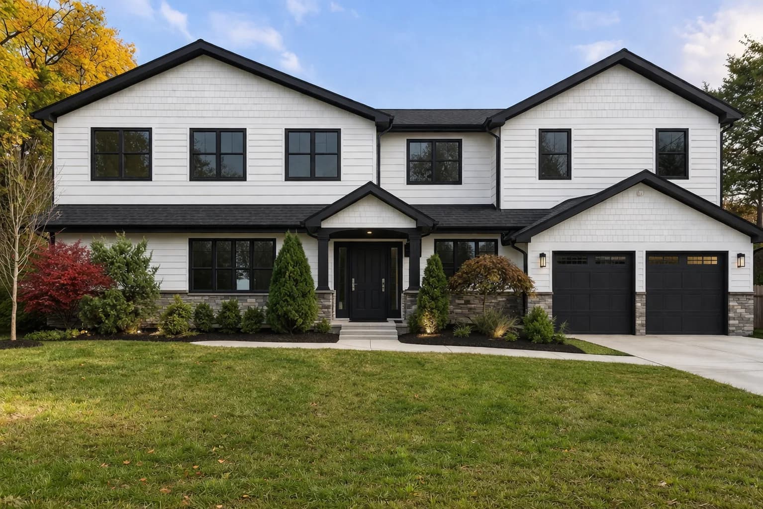 Modern New Jersey home with new siding, stone veneer and roofing by Father & Sons NJ Construction